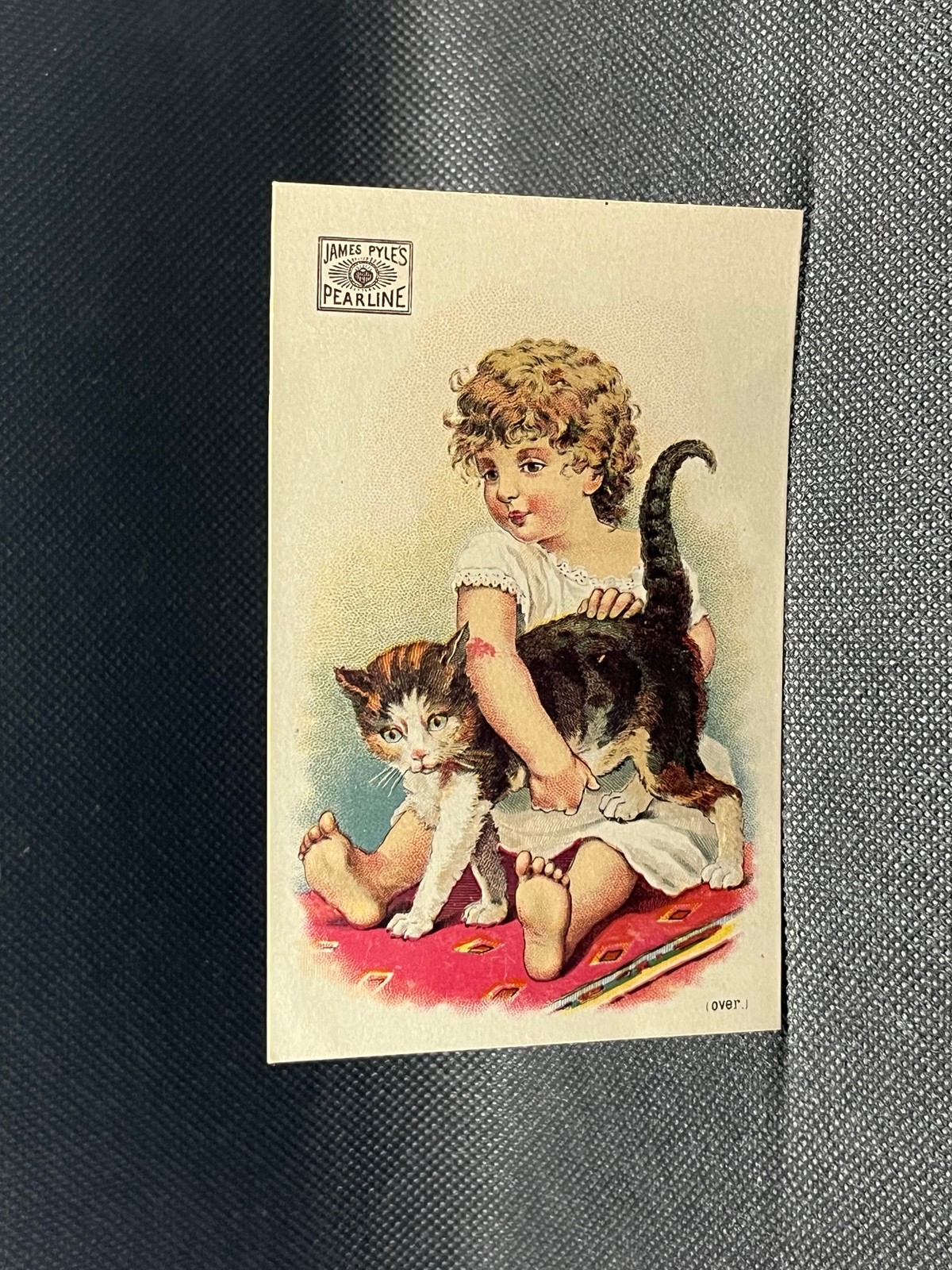 TRADE CARD JAMES PYLE\'S PEARLINE WASHING COMPOUND GIRL WITH A CAT