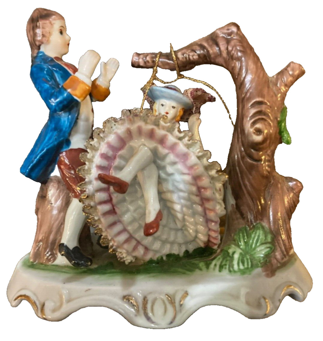 Satis-5 Unmarked Porcelain Gentleman and a Fine Lady on a Swing *A Satis-5 Unmarked Porcelain Gentleman and a Fine Lady on a Swing *A