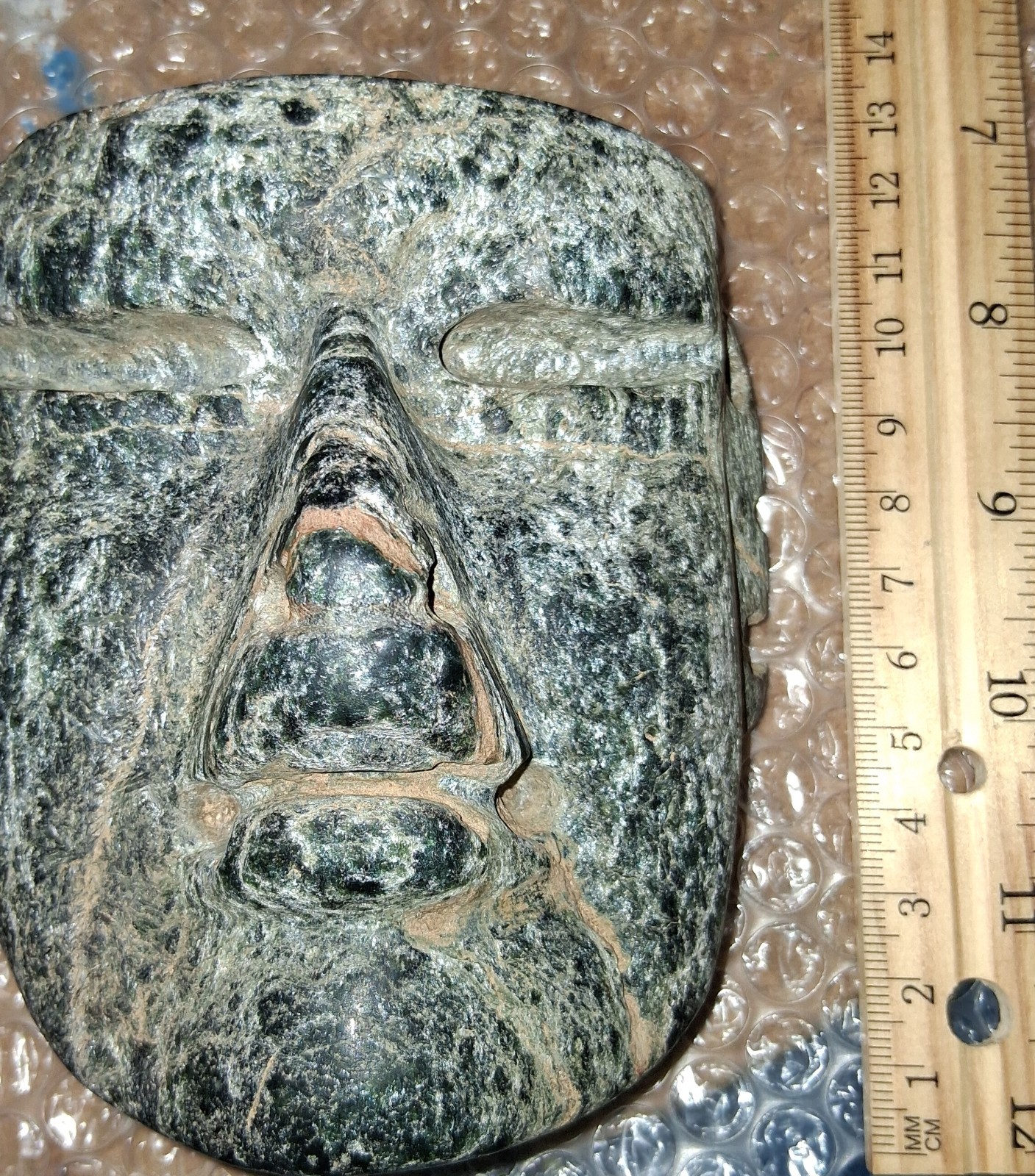Olmec Pre classic Pectoral stone mask burial offering pre columbian mesoamerican