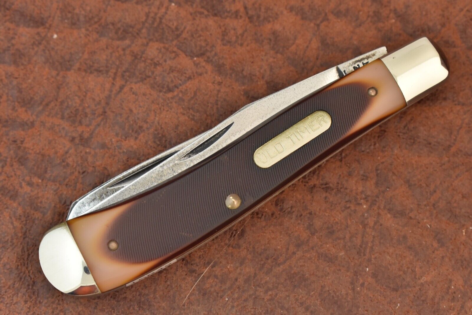 VINTAGE SCHRADE MADE IN USA OLD TIMER SAWCUT DELRIN TRAPPER KNIFE 94OT (15842)
