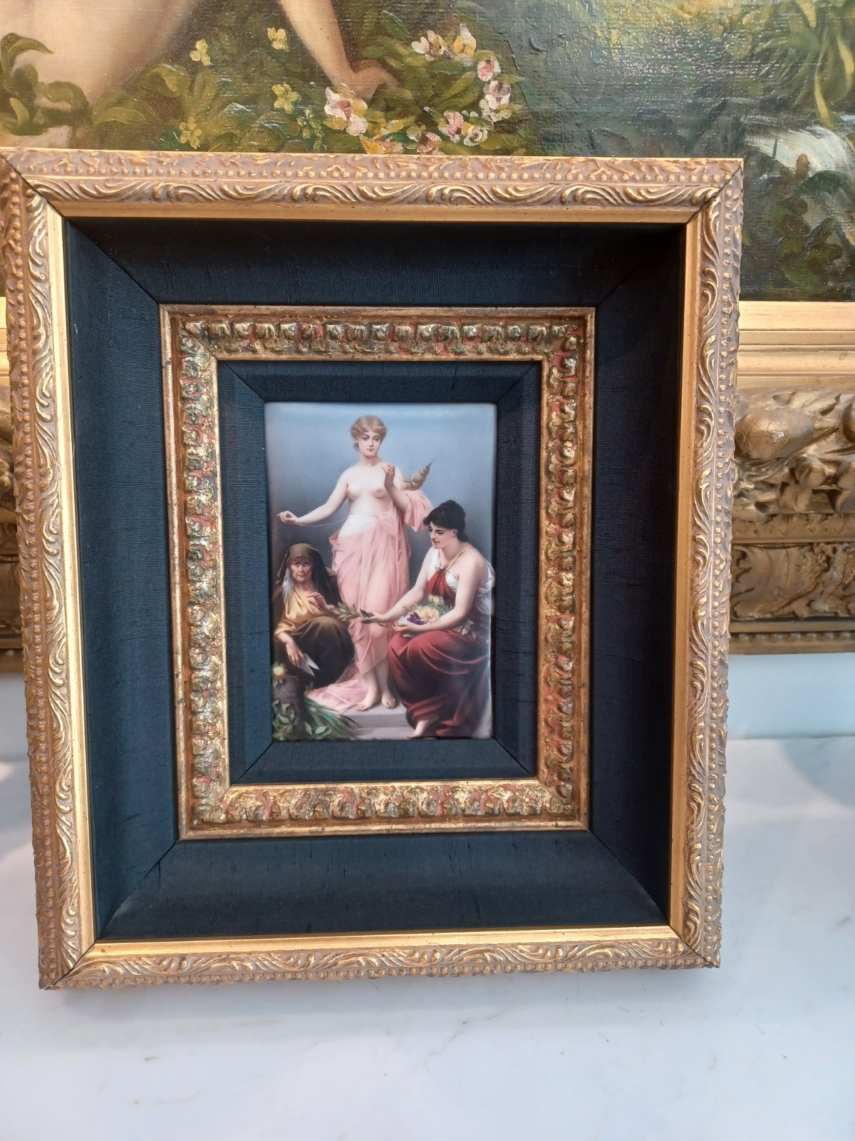Antique plaque in elaborate shadowbox frame
