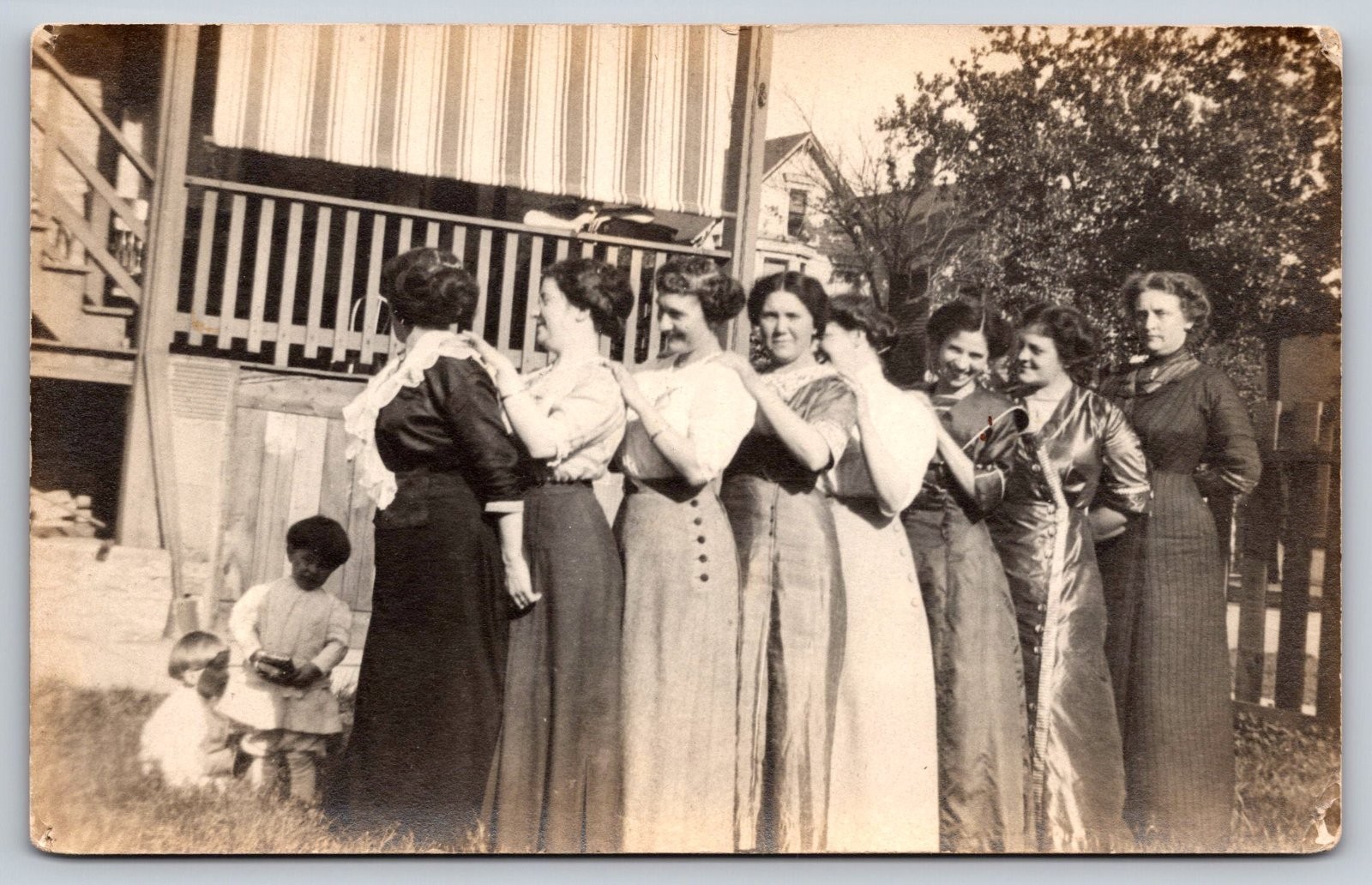 Eight Women And Two Children In Long Dresses Posing On Porch House Postcard RPPC