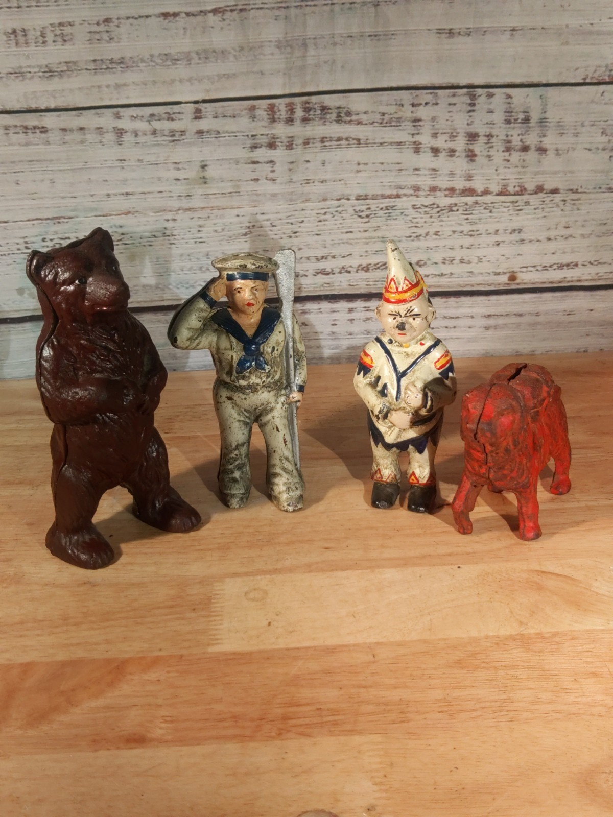 Lot Of 4 Cast Iron Coin Banks