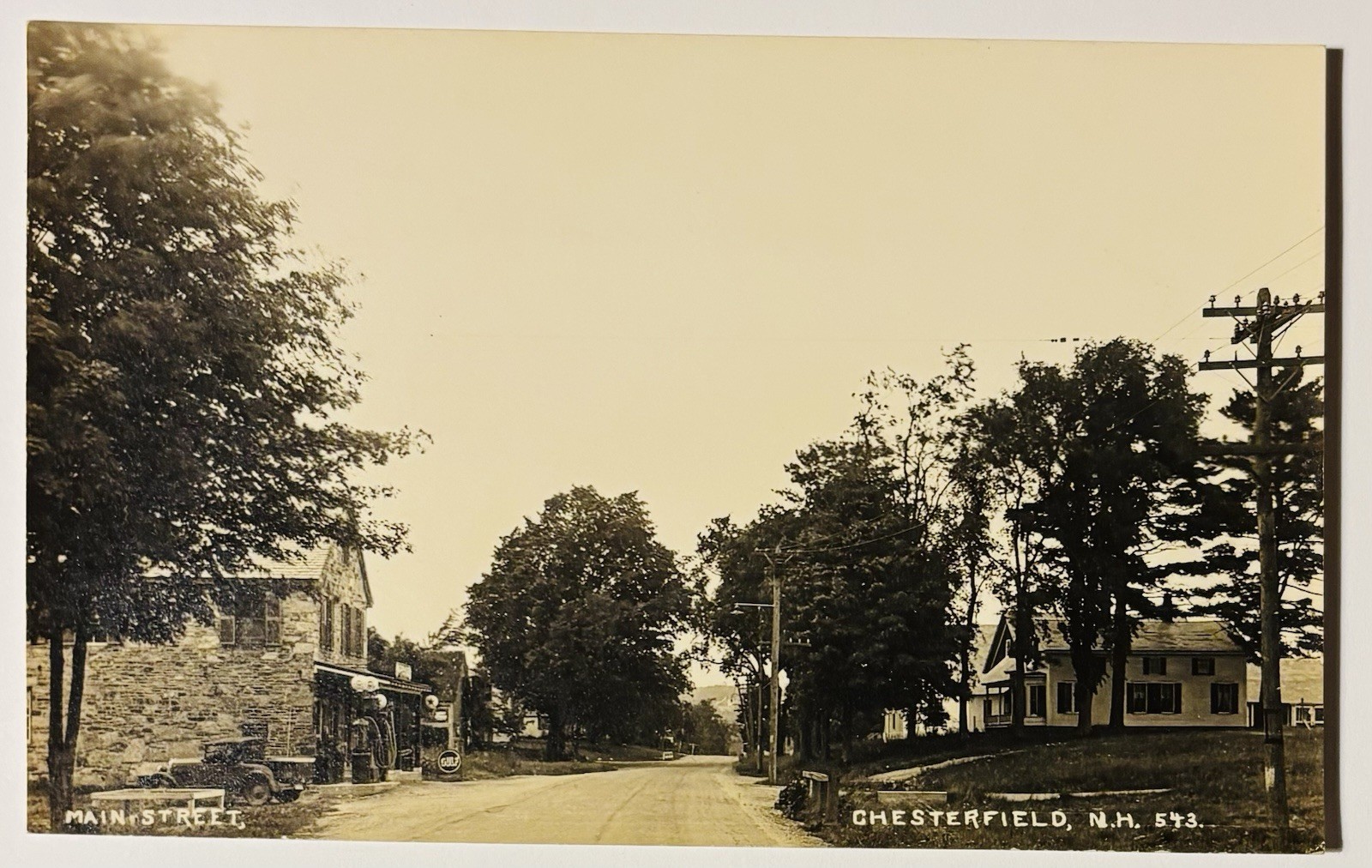 C. 1920’s Main St. in Chesterfield, New Hampshire Real Photo Postcard-Gulf Sign