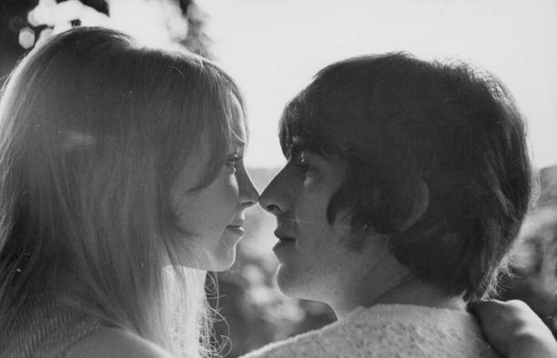 Beatles guitarist George Harrison and his wife Patti Boyd, relaxin- Old Photo