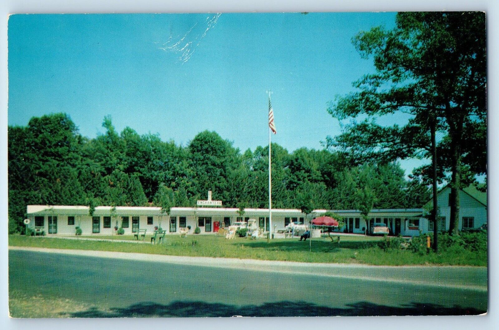Ephraim Wisconsin WI Postcard Motel Enchanteau Roadside View Building Trees 1960
