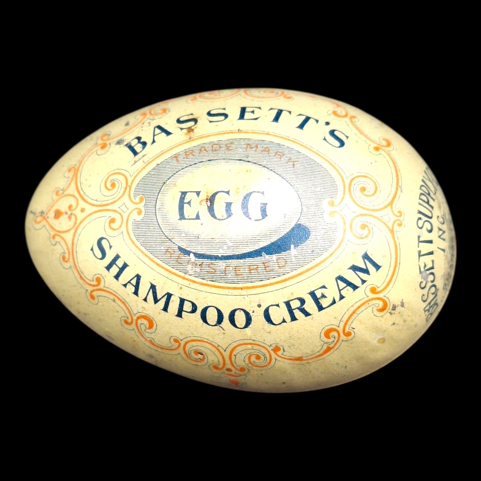 ANTIQUE BASSETT’S EGG SHAMPOO CREAM ADVERTISING TIN, ROCHESTER, NEW YORK 1906 ANTIQUE BASSETT’S EGG SHAMPOO CREAM ADVERTISING TIN, ROCHESTER, NEW YORK 1906