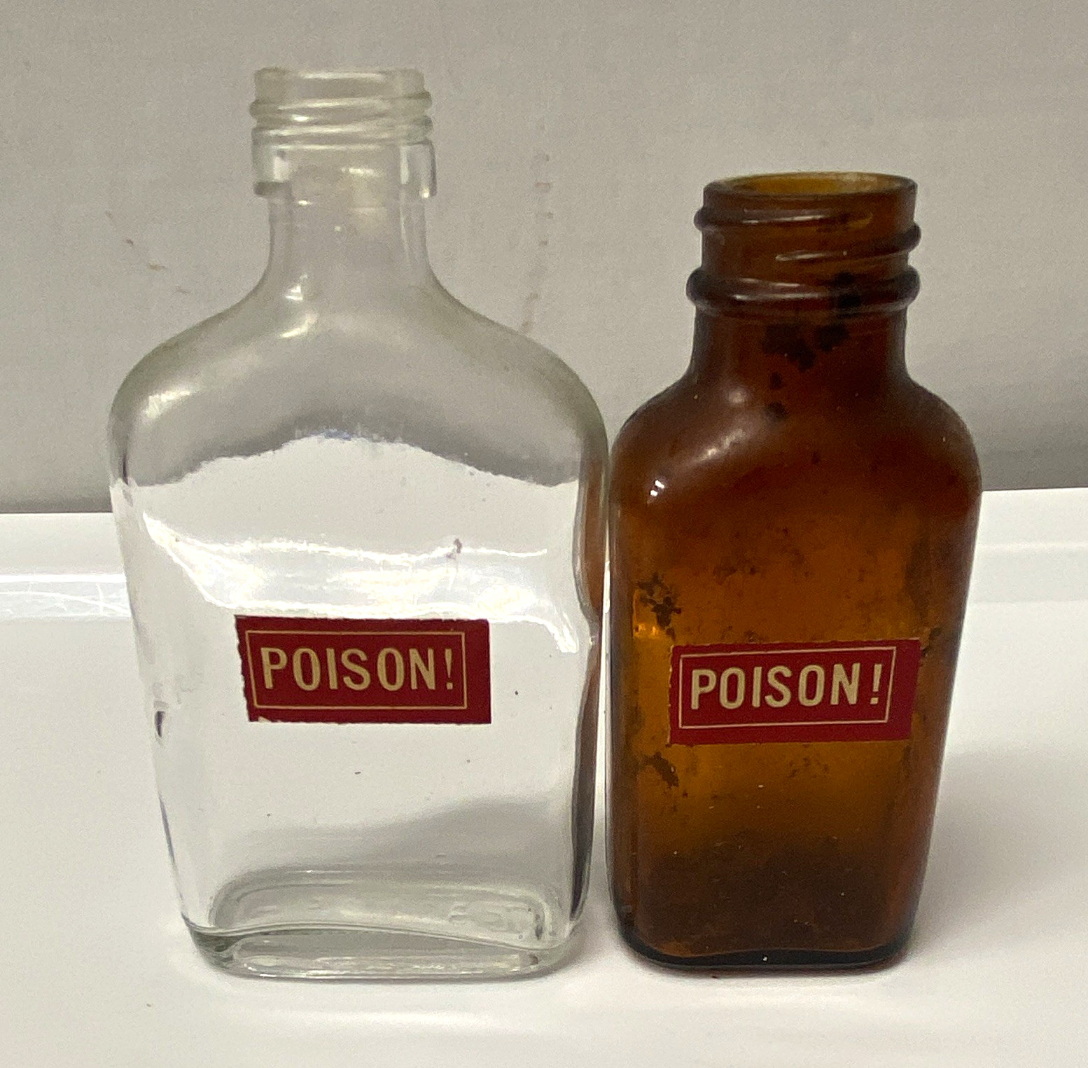 Lot of 2 Vintage Glass Poison Bottles Clear 5” & Amber 4” with \