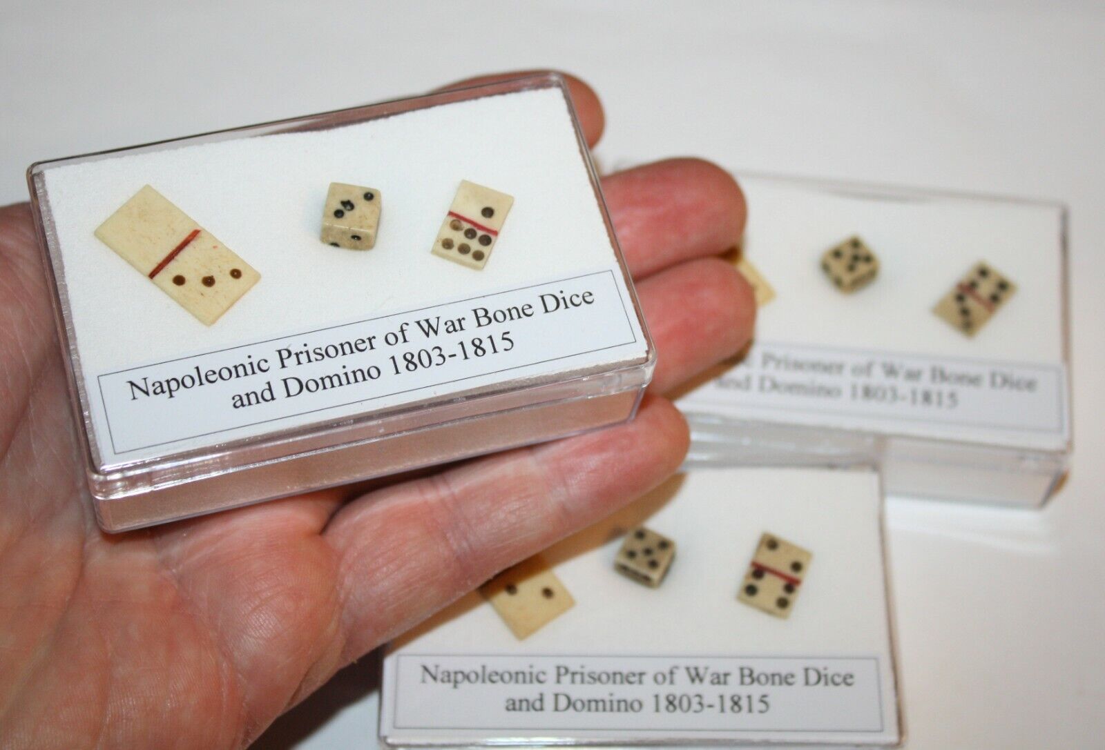 Napoleonic prisoner of war cow sheep dice and dominoes in display case 