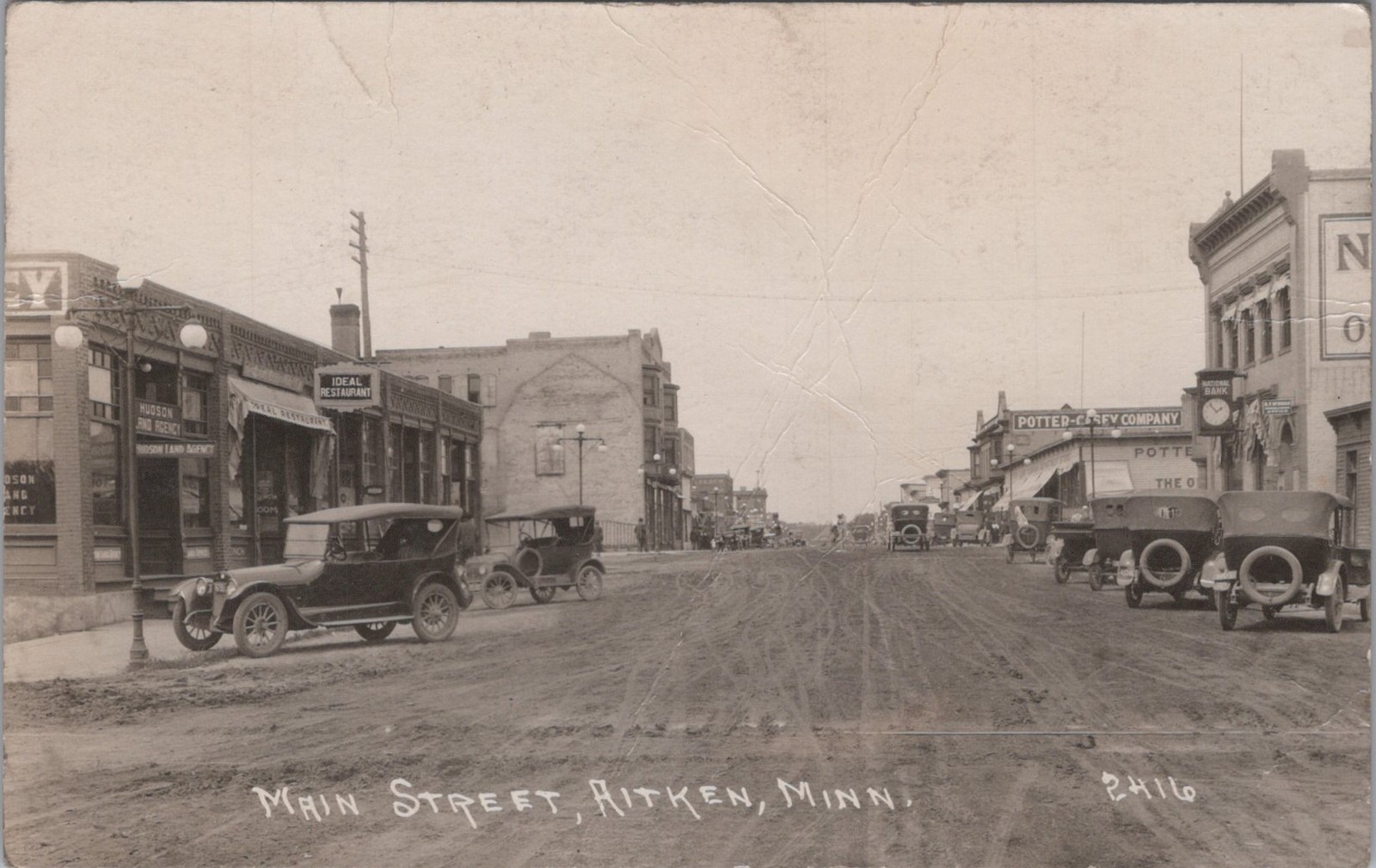 Main Street Aitkin Minnesota MN Ideal Restaurant Potter Cars RPPC 1920s Postcard