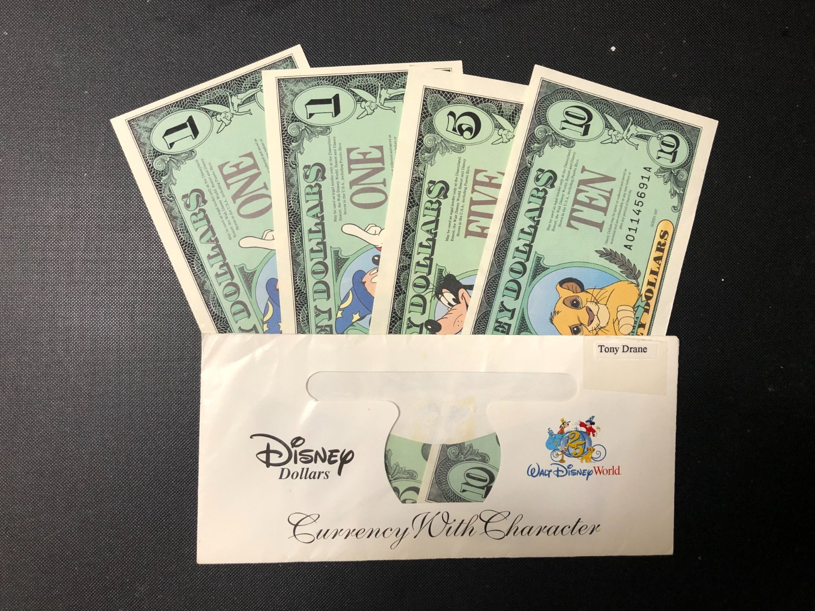 1997 Disney Dollars 25th Aniv. $1 (2 Consecutive Numbers), $5, $10 w/ Envelope