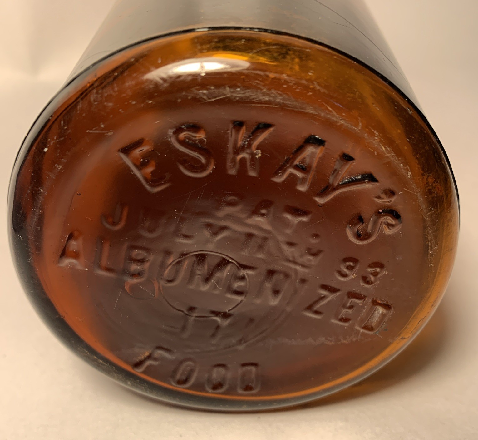 Antique ESKAY'S ALBUMENIZED FOOD July 11 1893 Golden Amber Jar 7.5” Ground Lip Antique ESKAY'S ALBUMENIZED FOOD July 11 1893 Golden Amber Jar 7.5” Ground Lip