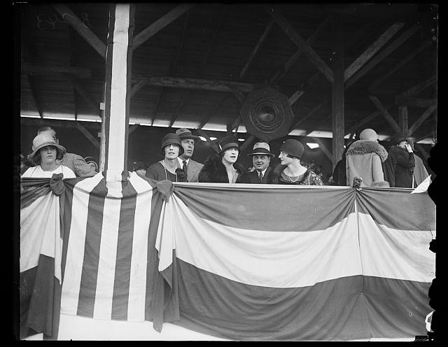 Photo:Thomas Mrs and Mr 1920s Spectators at Stadium with Flags