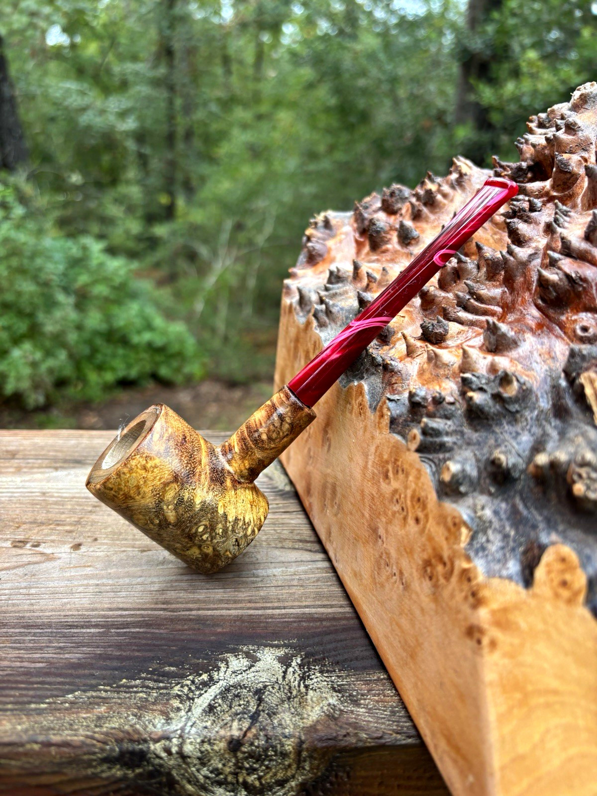 Olive wood poker with Amboyna burl veneer and red ripple straight acrylic stem