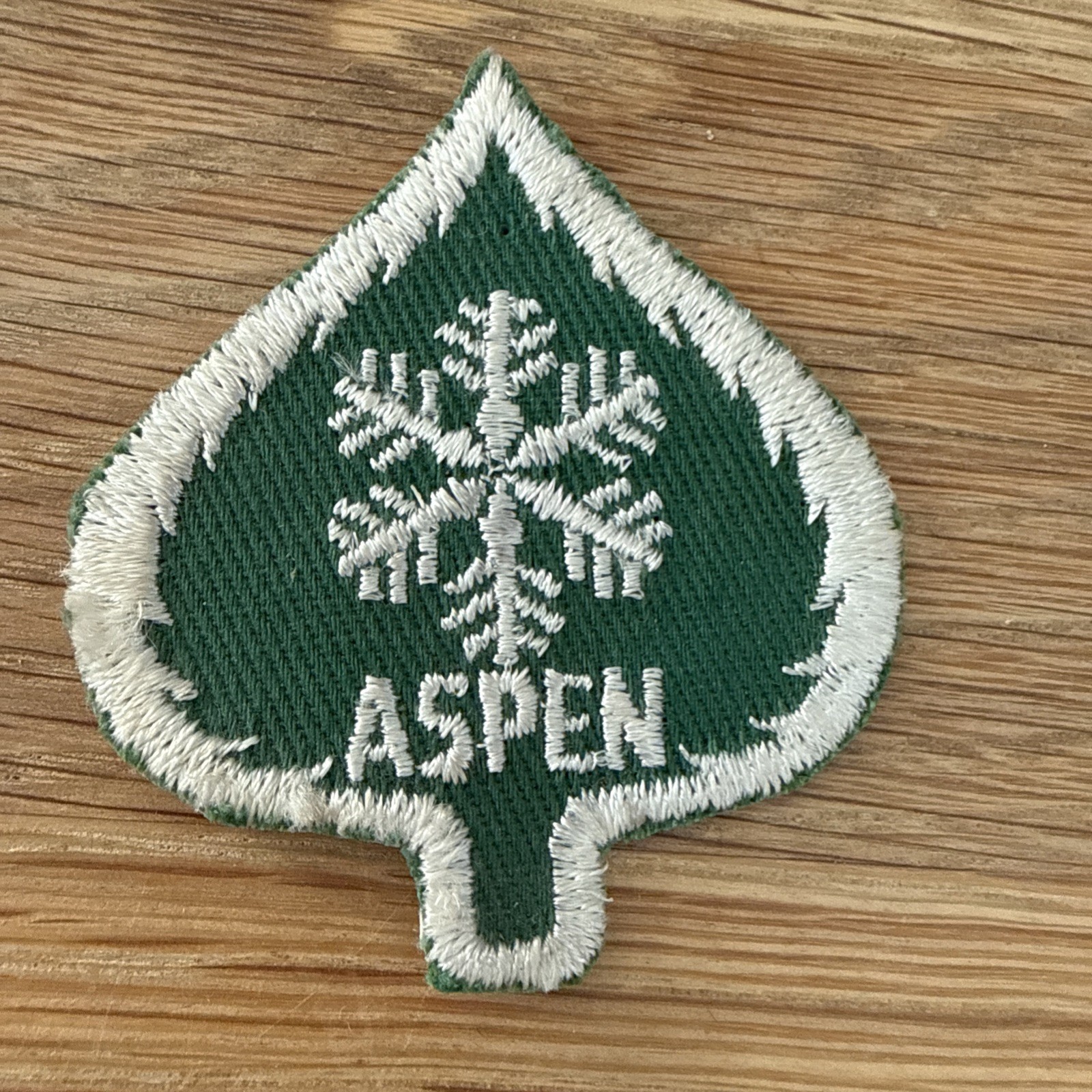 Vintage Aspen Ski Area Leaf Shaped Green & White Snowflake Embroidered NOS Patch