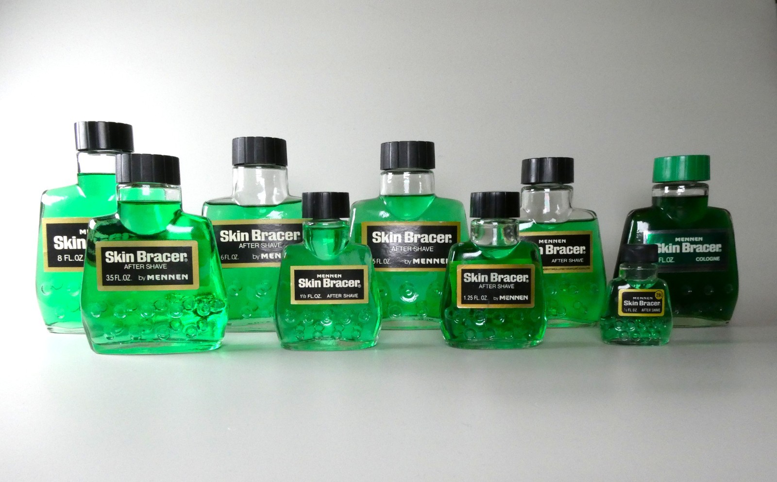 Mennen Skin Bracer Early 1970s 9 Bottles, 8oz, 6, 5, 4, 3 1/2, 1 1/2, 1 1/4, 1/2