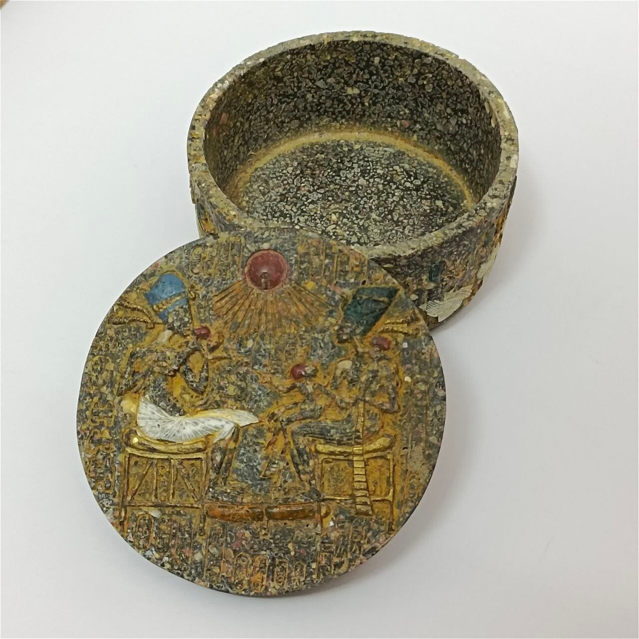 Antique-style sculptures of kings, pharaohs, and ancient Egyptian figures