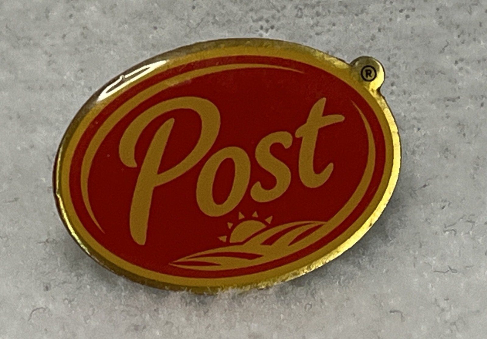 Post Red and Gold Metal Pin