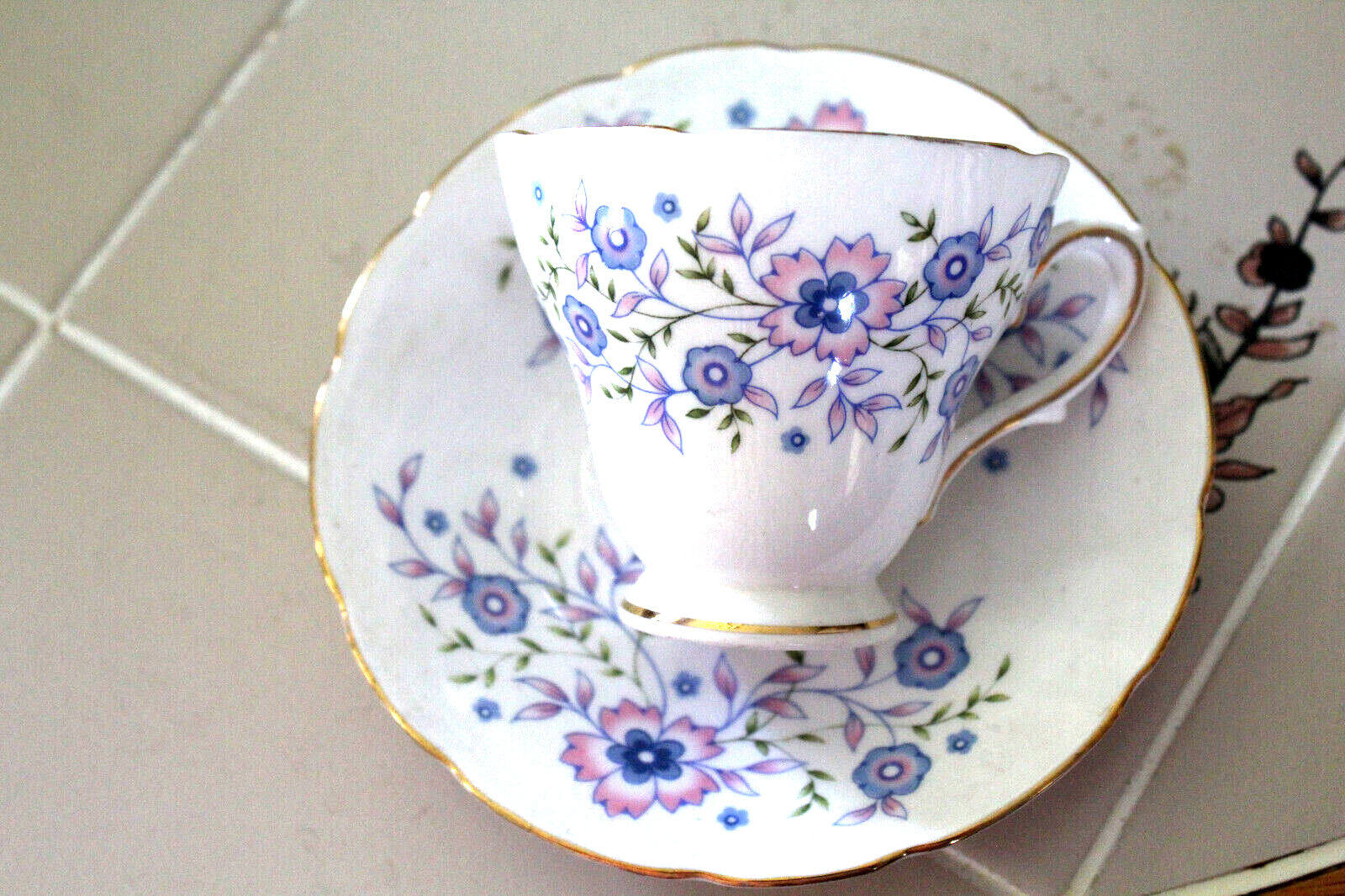 FINE BONE CHINA BLUE BLOSSOM CUP AND SAUCER MADE IN ENGLAND FOR AVON 1974 FINE BONE CHINA BLUE BLOSSOM CUP AND SAUCER MADE IN ENGLAND FOR AVON 1974