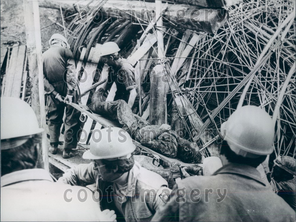 1974 Workers Carry Injured Man Bridge Collapse Kempton Bavaria Press Photo