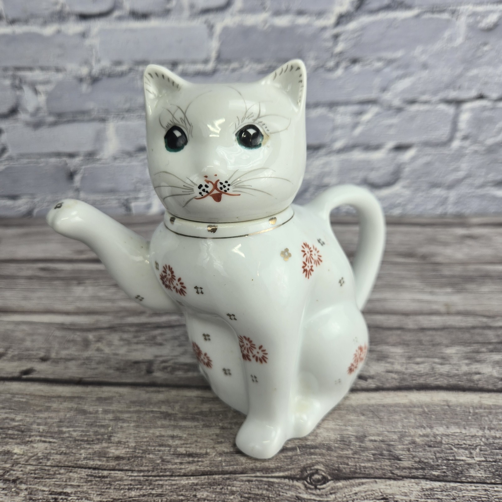 Vintage Chinese porcelain teapot in the shape of a cat Maneki-neko \