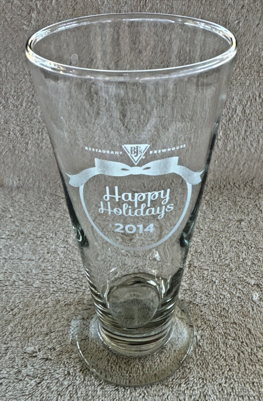 BJ\'s Brewhouse Beer Glass HAPPY HOLIDAYS 2014 Footed Pilsner Beer Glass BJ\'s Brewhouse Beer Glass HAPPY HOLIDAYS 2014 Footed Pilsner Beer Glass