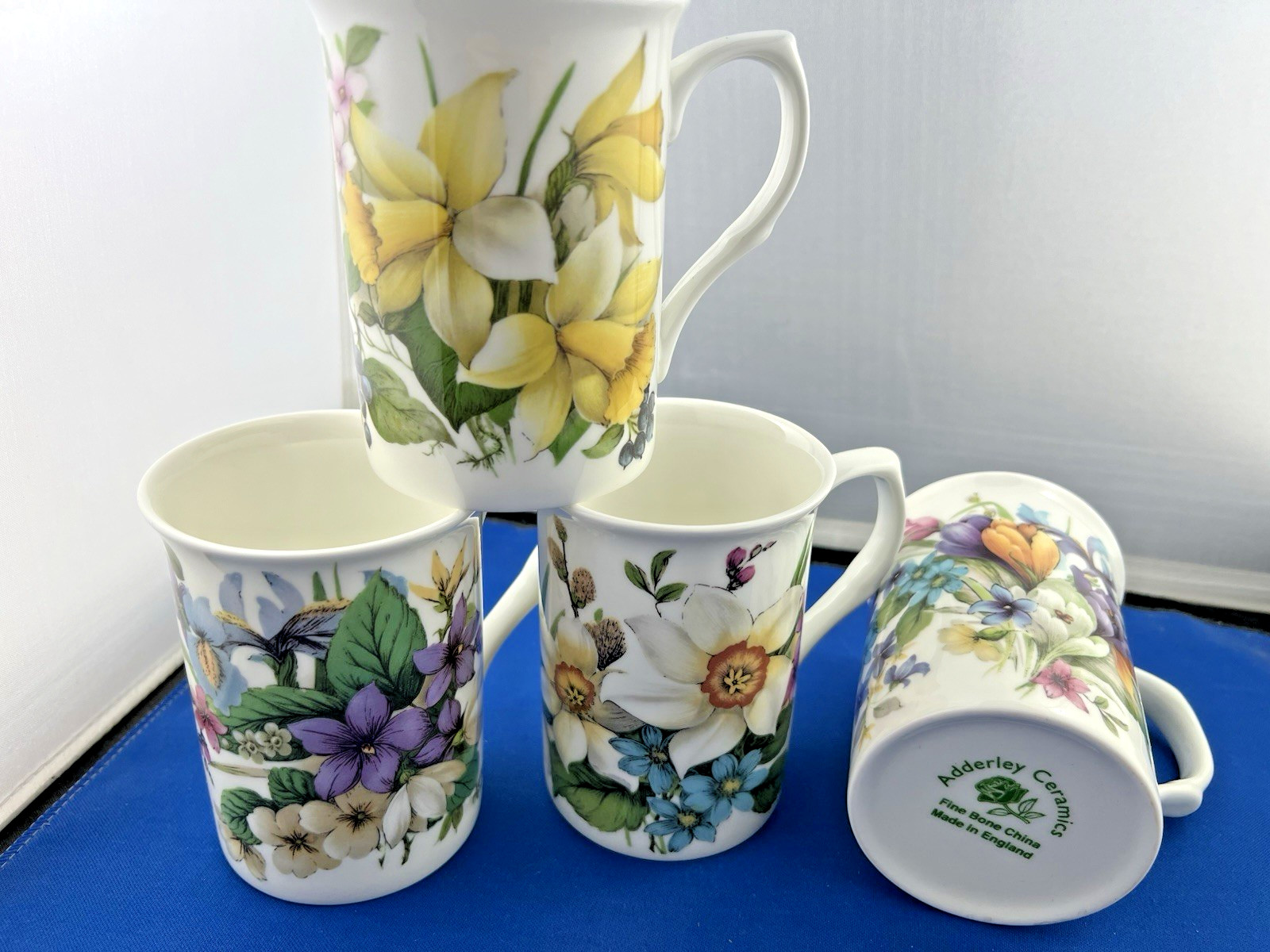 SPRING SET OF 4 DIFFERENT, FINE BONE CHINA MUGS ENGLISH MADE..NEW UNUSED