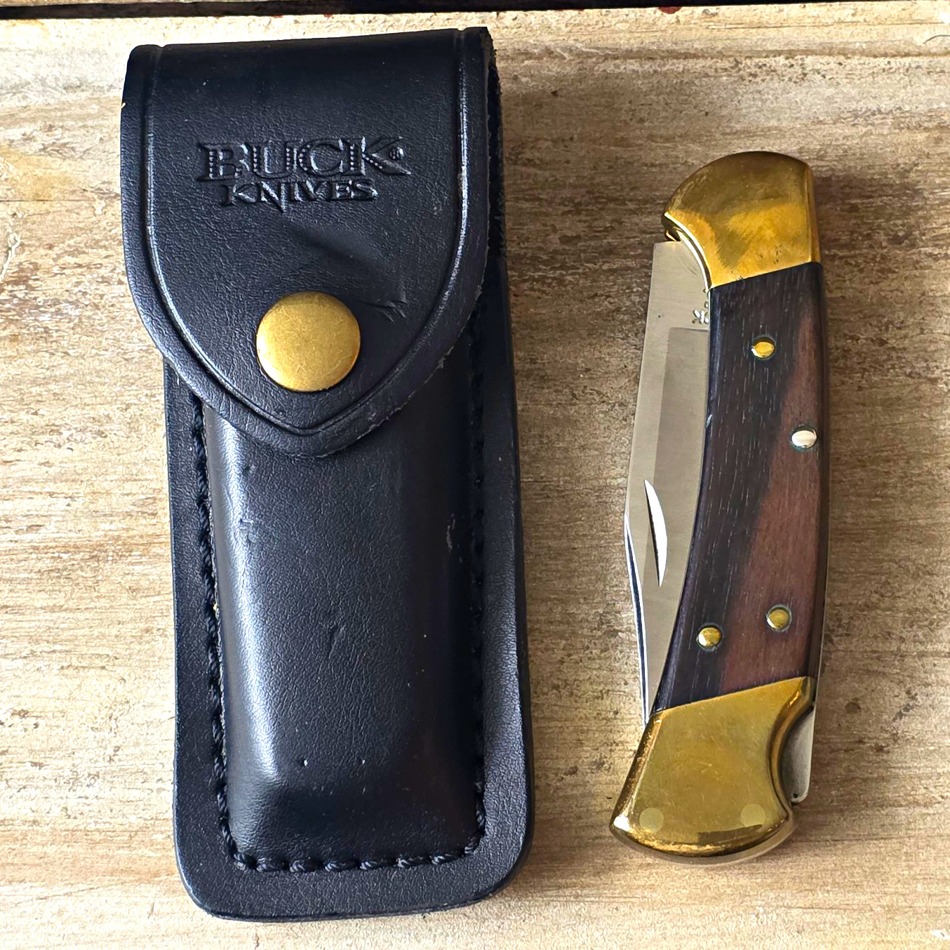 Vintage 1991 Buck 112 Ranger pocket knife lockback with leather sheath USA