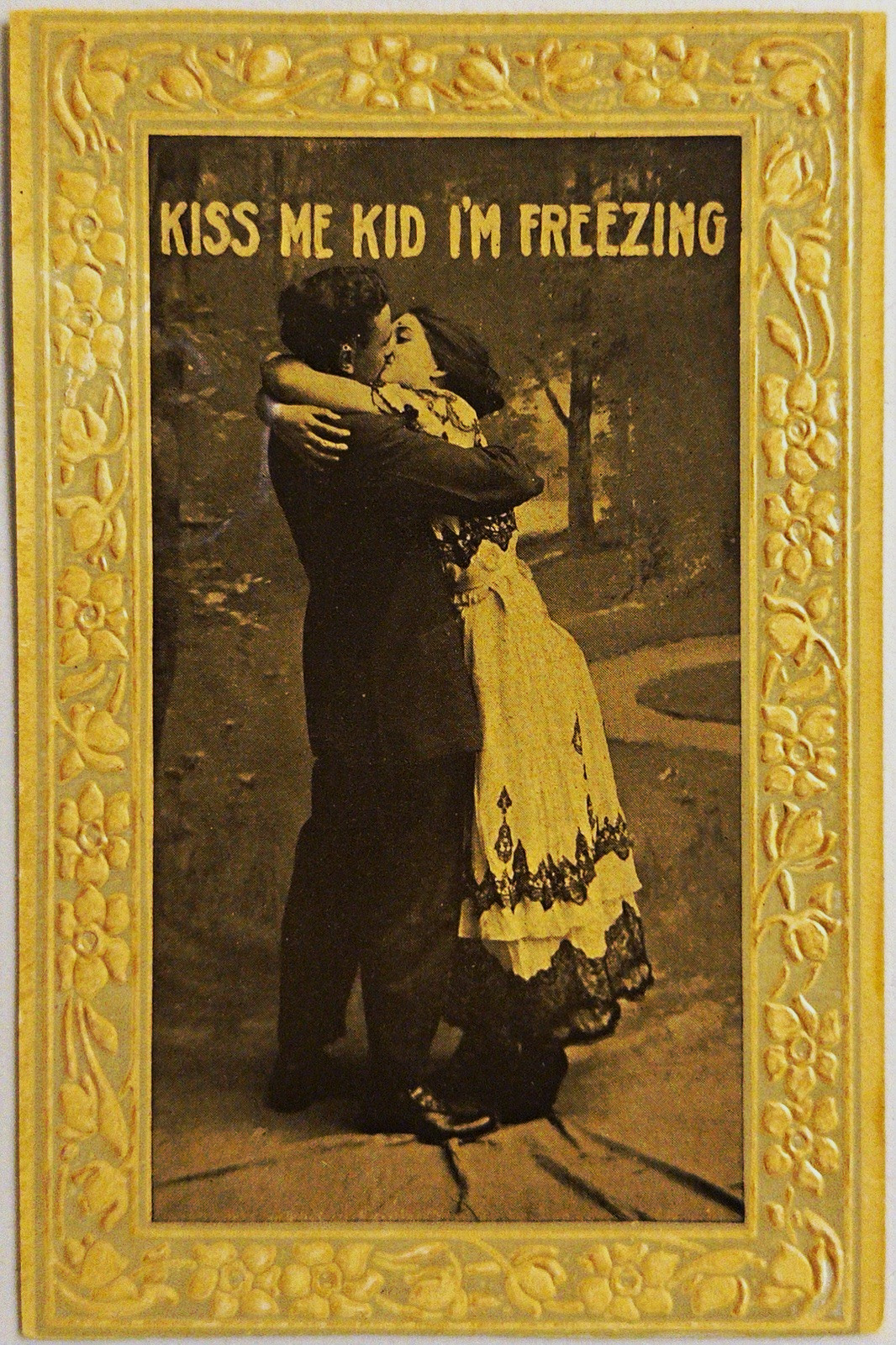 Antique Embossed Romance “Kiss Me Kid I’m Freezing” Couple Postcard 1910s