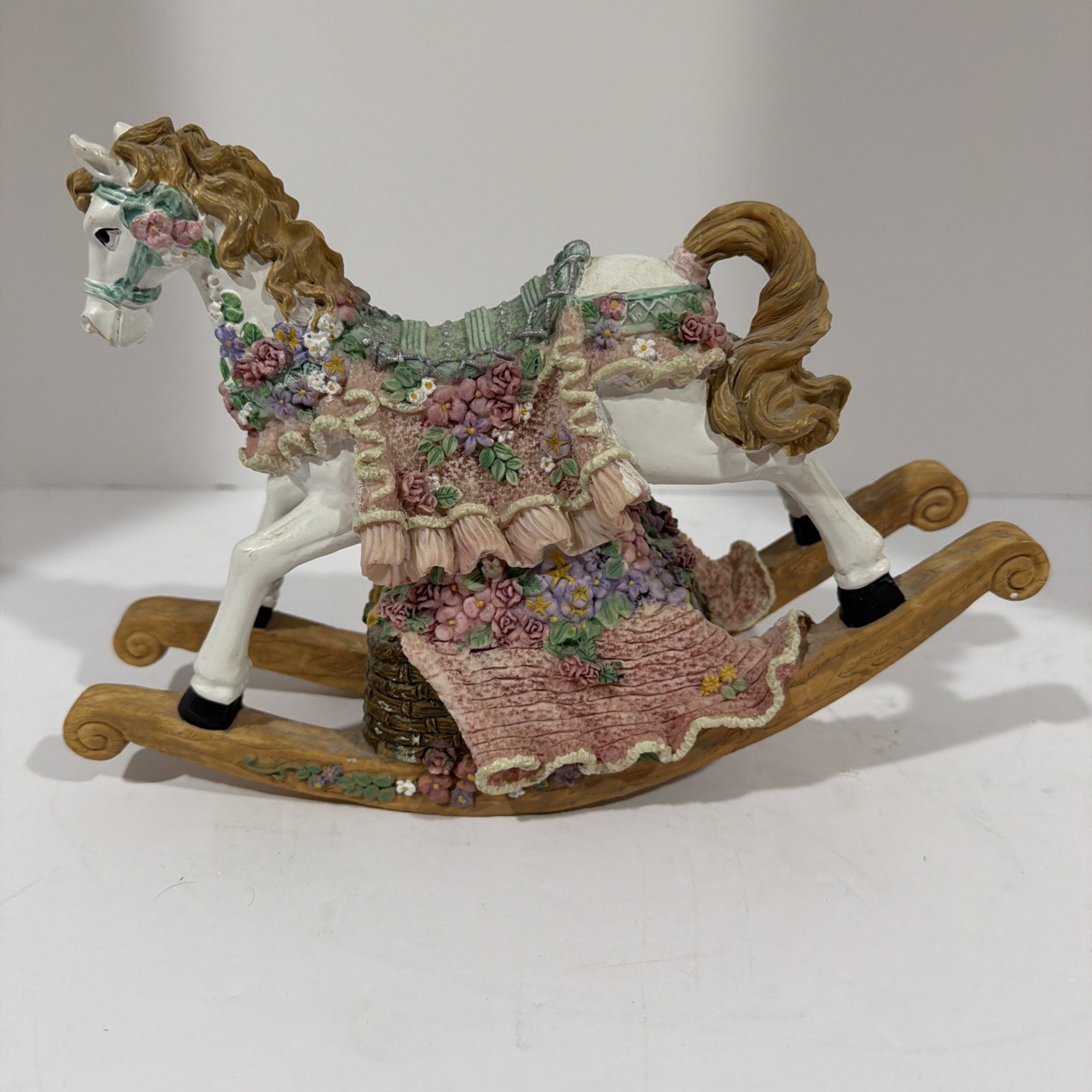Classic Treasures Resin Musical Rocking Horse—Plays “The Impossible Dream”.