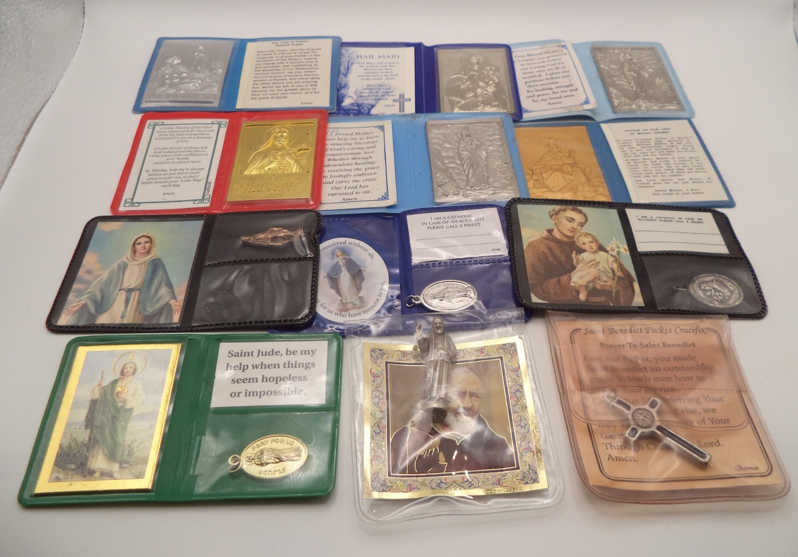 Lot of 12 Vintage Catholic Pocket Shrines Prayer Wallets Medals St Jude Benedict