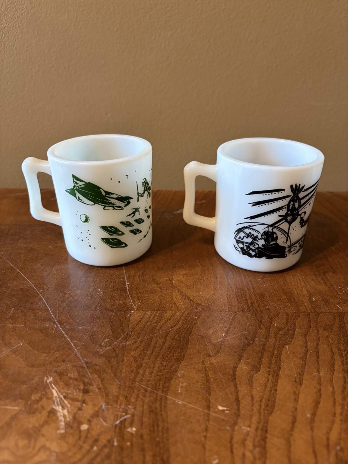 Vintage Hazel Atlas Buck Rogers Child’s Milk Glass Mugs. 1950\'s Space Age. Vintage Hazel Atlas Buck Rogers Child’s Milk Glass Mugs. 1950\'s Space Age.