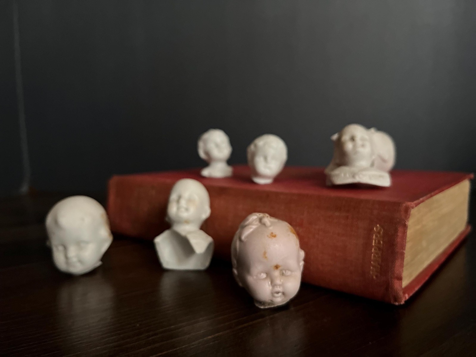 Antique german bisque doll heads: frozen charlotte assemblage parts