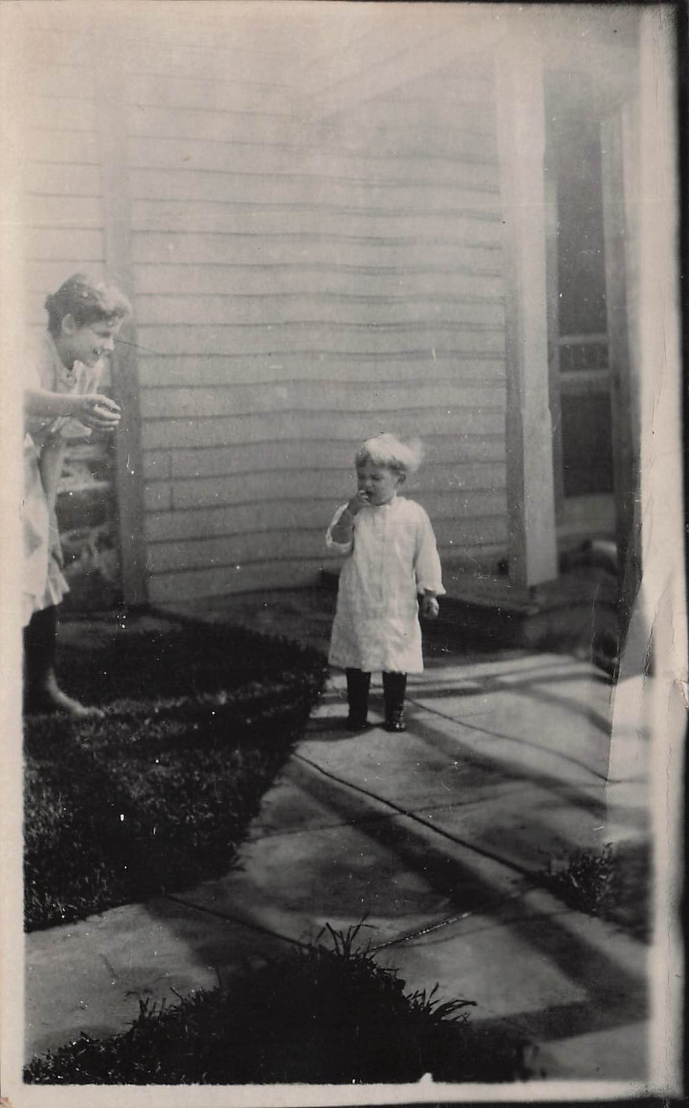 Toddler Eating Outside House Woman Watching Snapshot RPPC Photo Postcard 28A