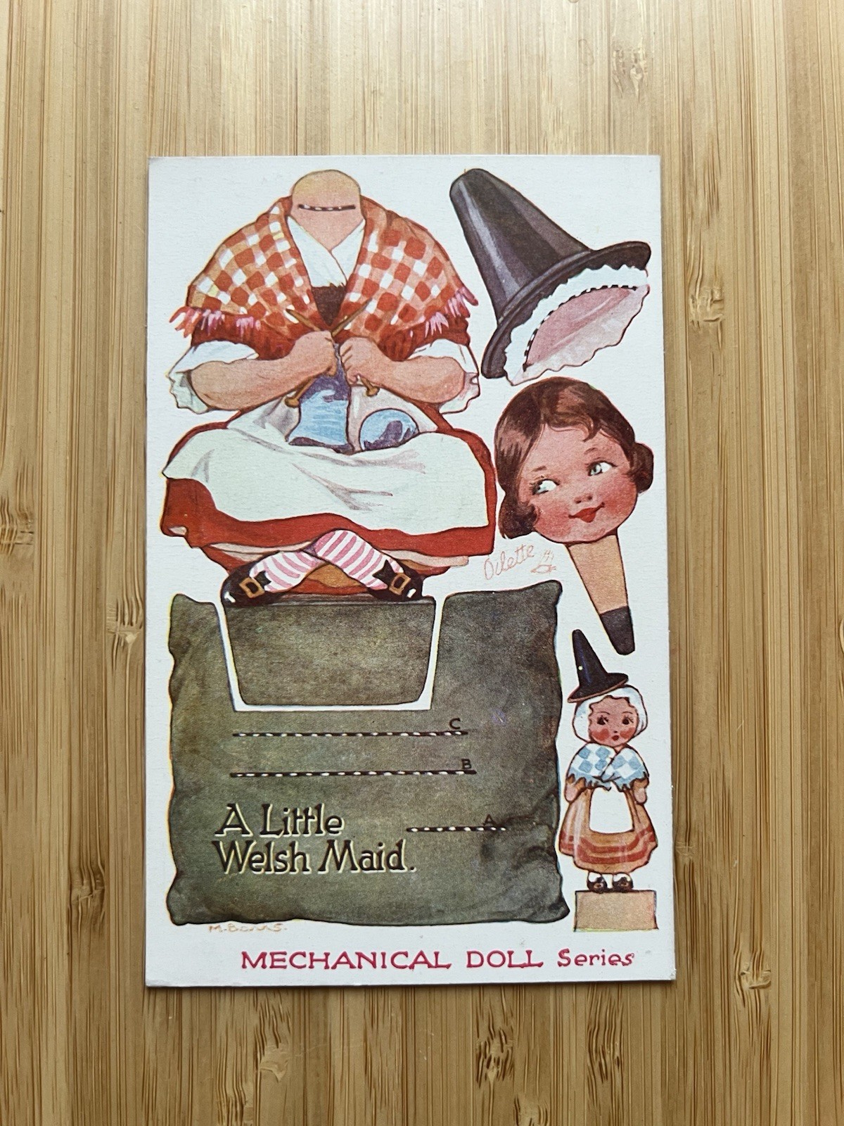 Vintage Raphael Tuck Mechanical Doll Series Postcard c1910s A Little Welsh Maid