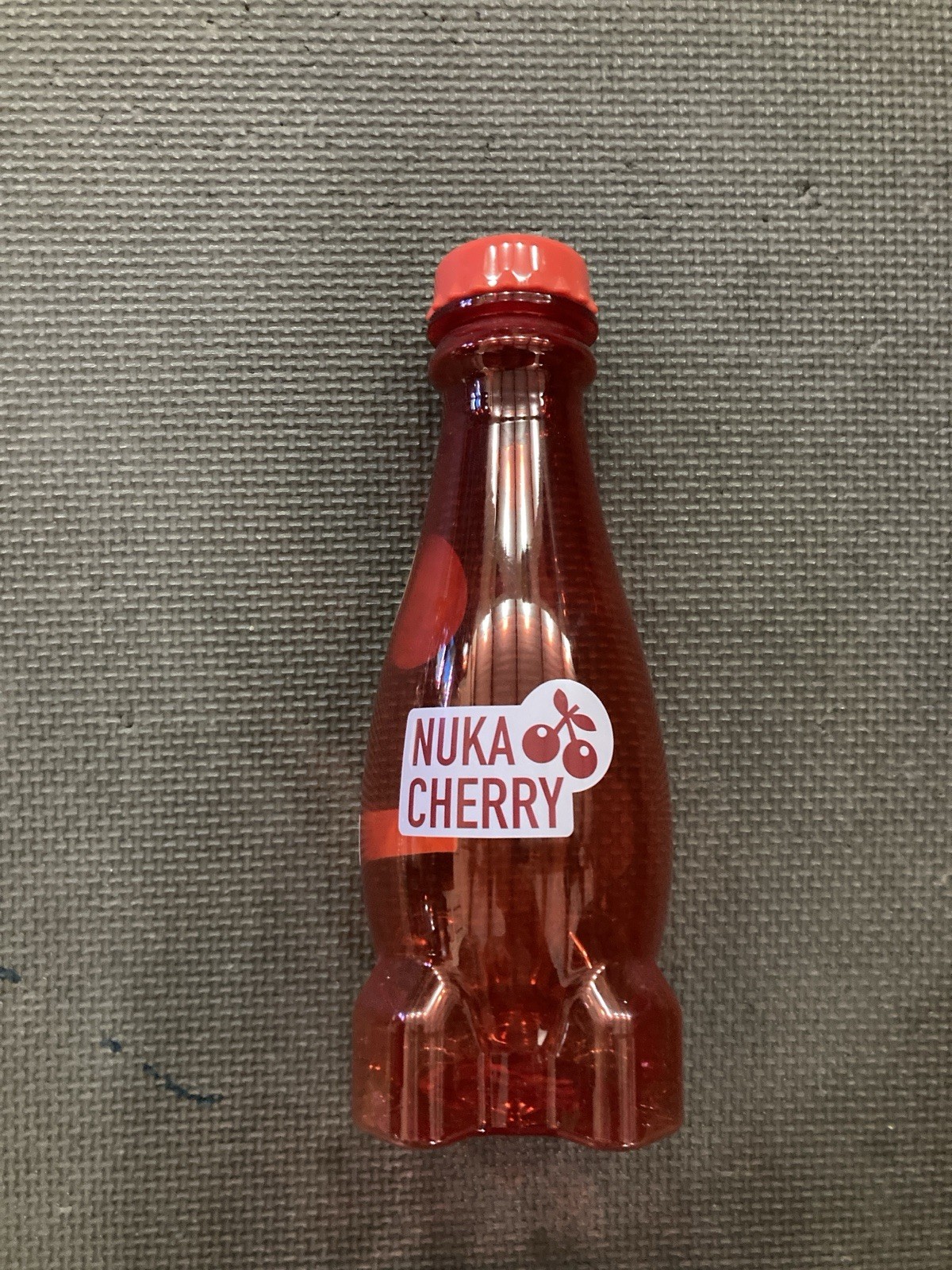 New Cherry Nuka Cola Water Bottle with Red Cap. Fallout Officially Licensed 