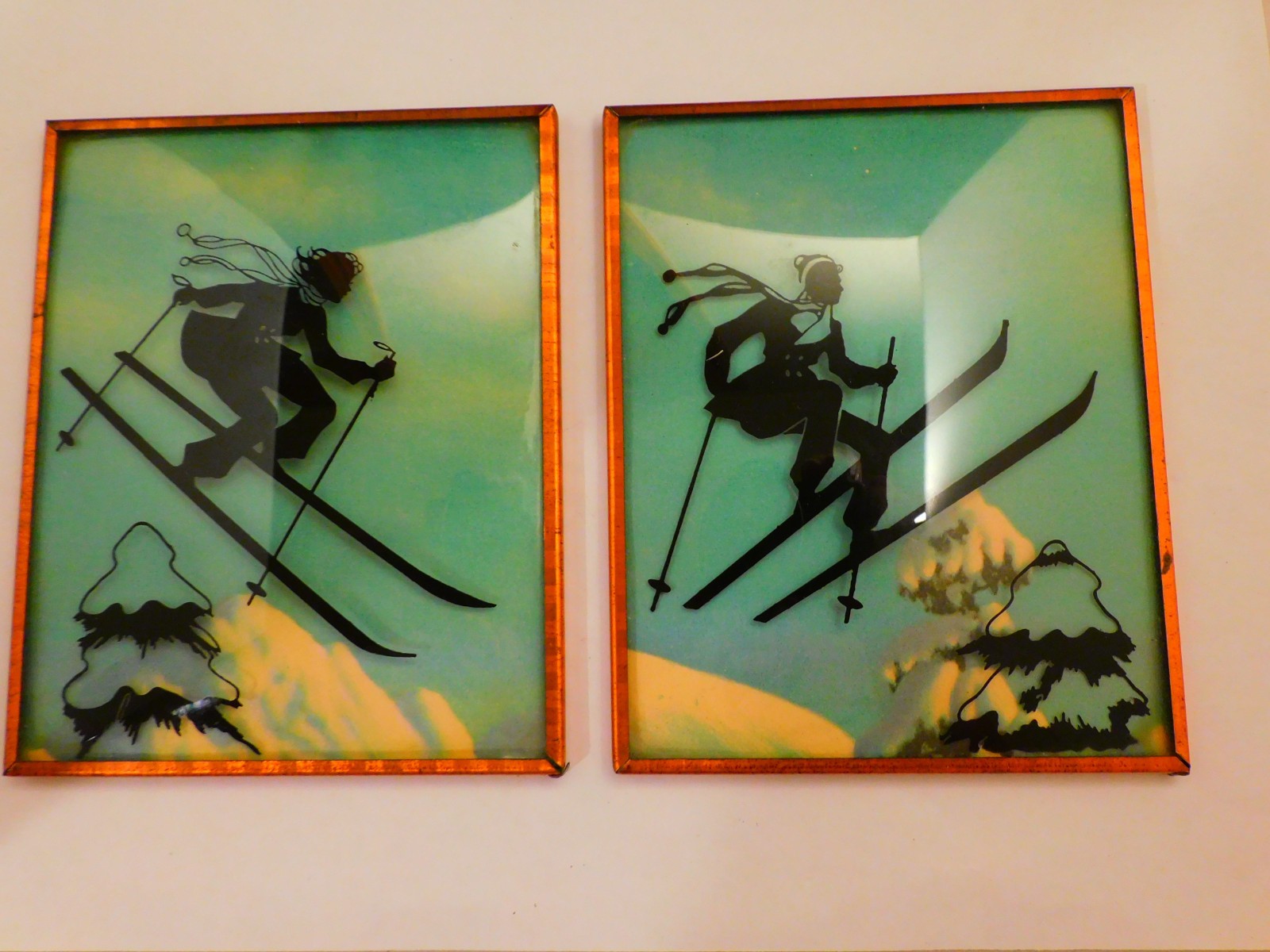 Great Vintage Pair  1940s Skiing Silhouettes Man & Woman Copper  W/ Curved Glass