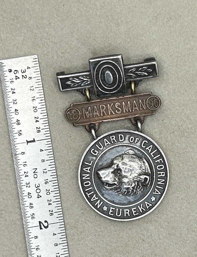 ANTIQUE 1896 SHREVE AND CO, CALIFORNIA MARKSMAN MEDAL IN STERLING AND COPPER