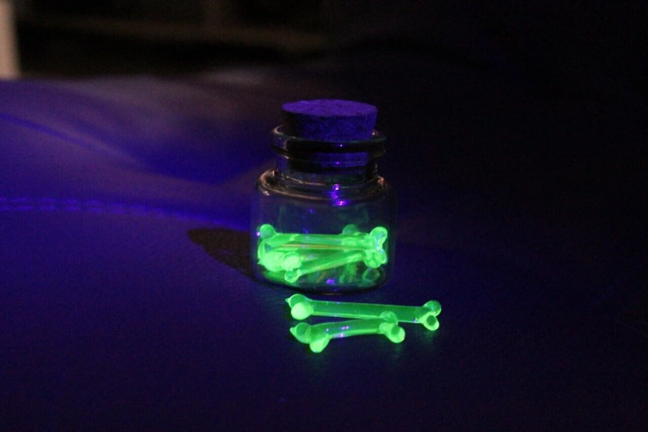 Uranium Glass micro bones, Glow in the Dark bones in a Bottle