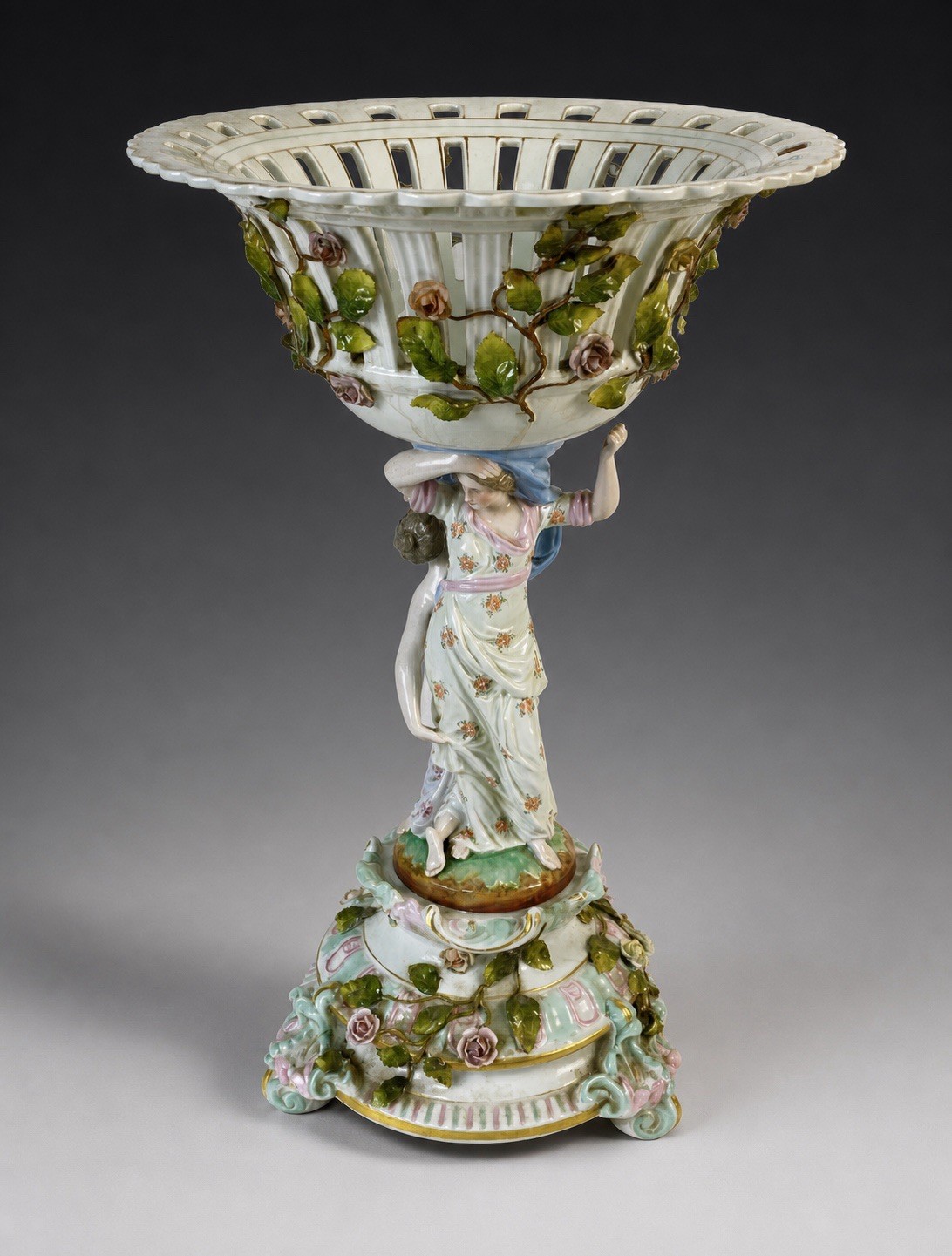 Stunning antique German figural porcelain centerpiece compote.