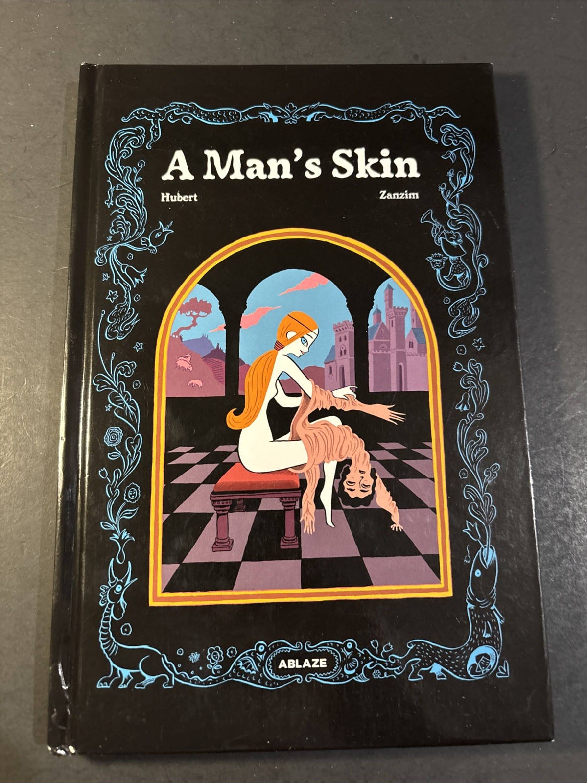A Man\'s Skin Hardcover HC Graphic Novel ABLAZE Renaissance Fantasy JL