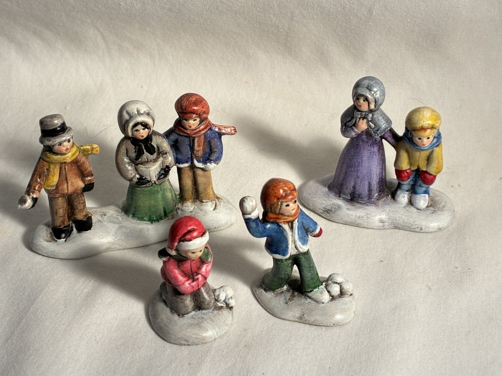 Christmas Village People Lot of 4 Pieces Or 7 People.  Approximately 2\