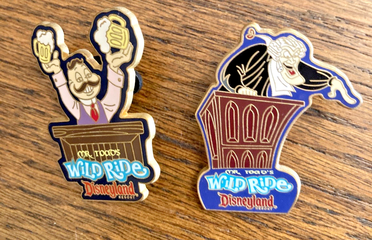 A PAIR OF PINS FROM MR TOAD'S WILD RIDE- THE JUDGE AND WINKY A PAIR OF PINS FROM MR TOAD'S WILD RIDE- THE JUDGE AND WINKY