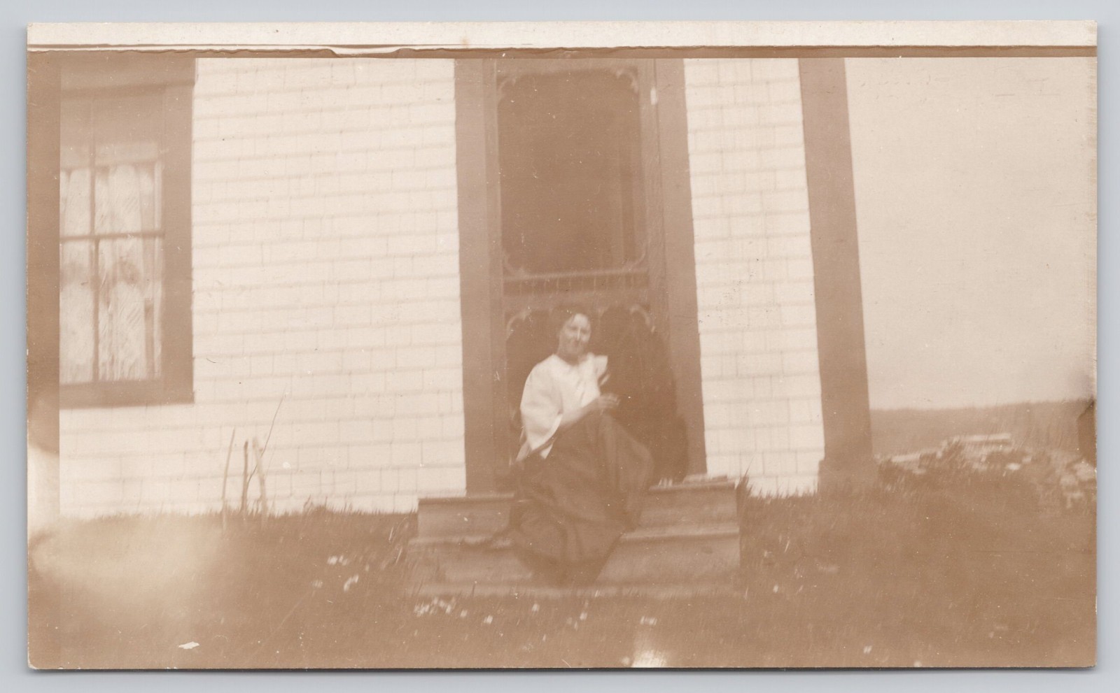 RPPC Unidentified Woman Sitting on Porch Real Photo Postcard