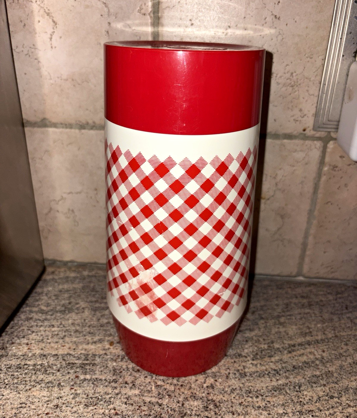 vintage Thermo-Serv insulated tumbler by West Bend featuring a red-and-white