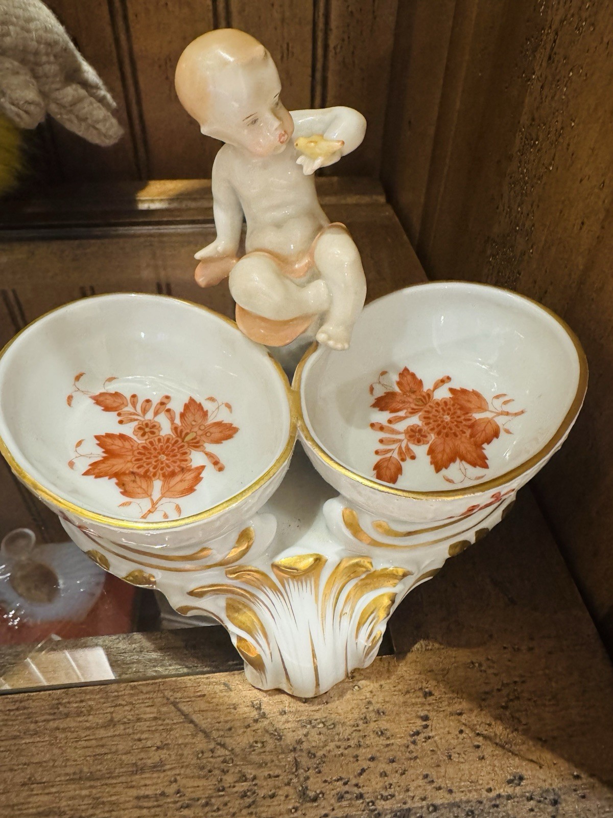 Herend Chinese Bouquet Rust porcelain twin salt cellar with a putto cherub