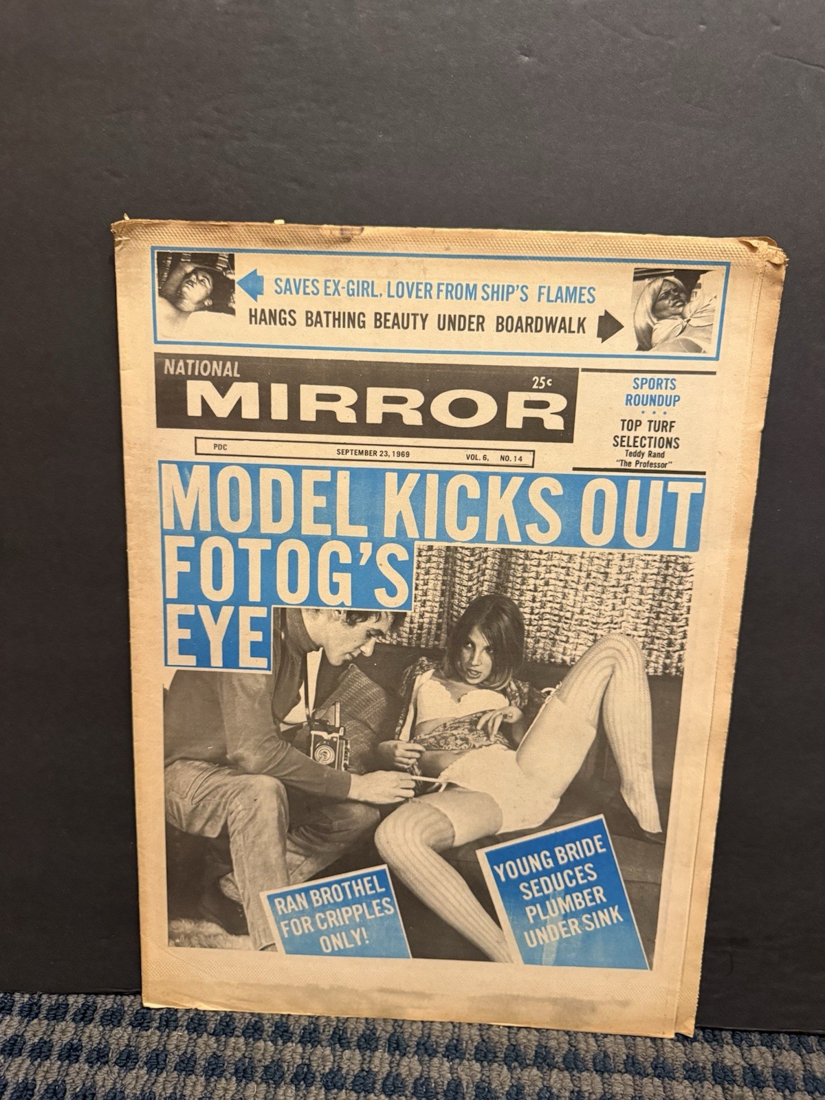 1969 National Mirror Newspaper, Model Kicks Out Fotog’s Eye, Centerfold (10W)