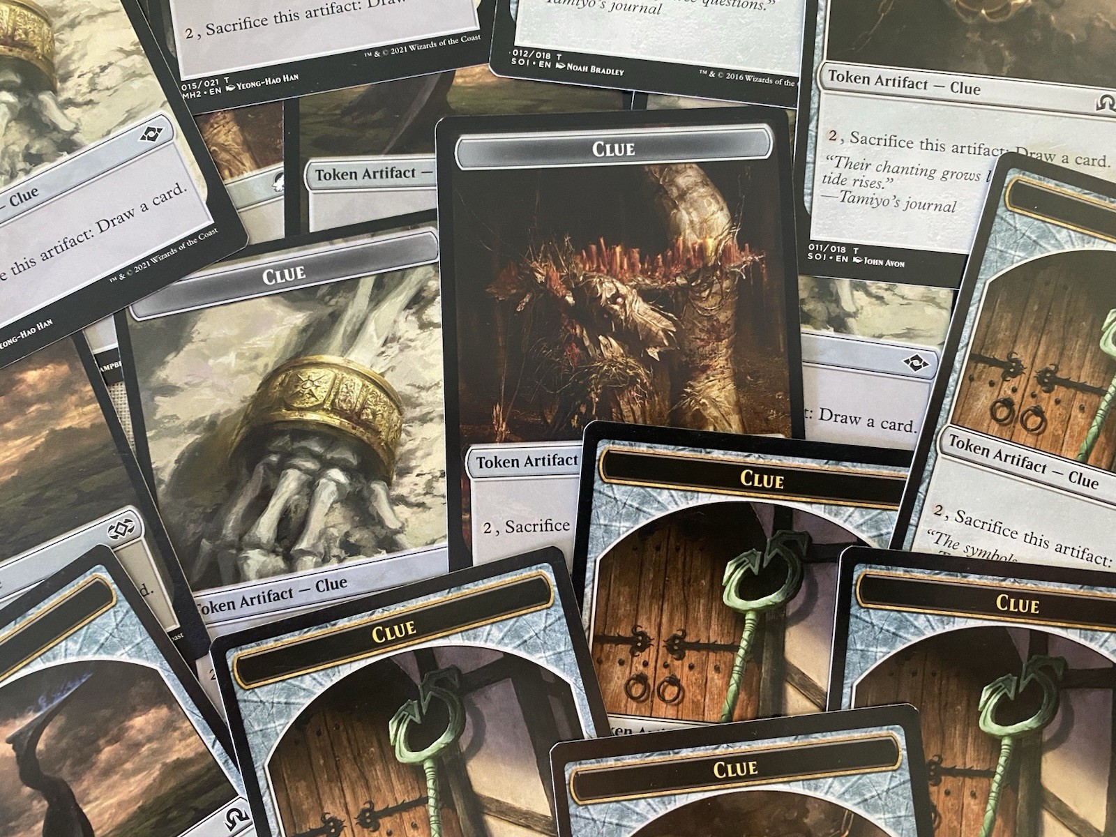 MTG 15 x Clue Tokens - Regular Finish Magic The Gathering - Various Art MTG 15 x Clue Tokens - Regular Finish Magic The Gathering - Various Art