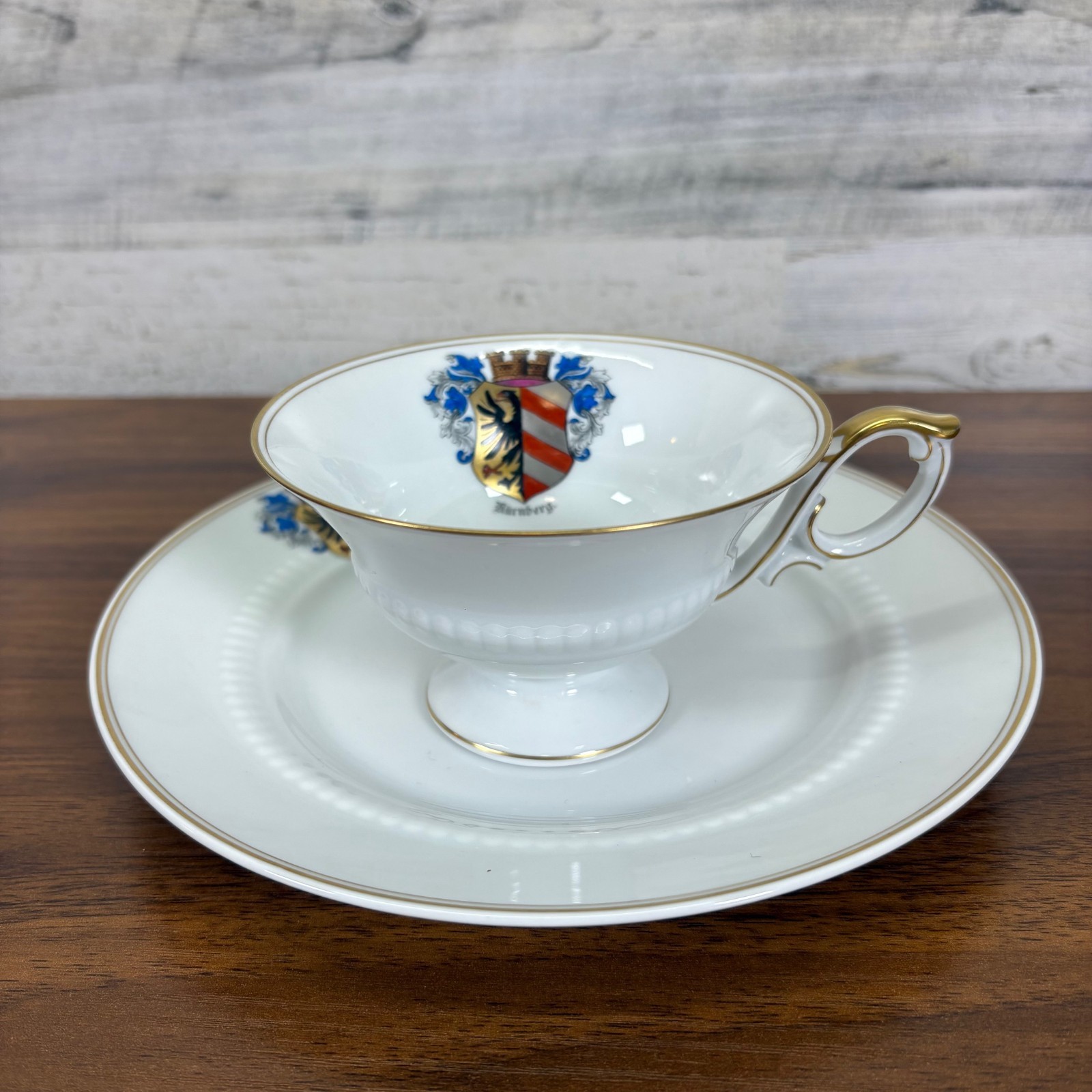 ANTIQUE VOLKSTEDT Porcelain Coat of Arms Nuremberg Germany Teacup and Saucer ANTIQUE VOLKSTEDT Porcelain Coat of Arms Nuremberg Germany Teacup and Saucer