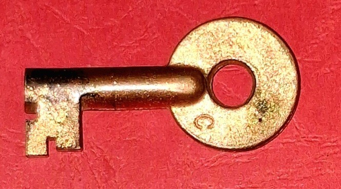 Vintage Hollow Barrel Brass Key Marked 